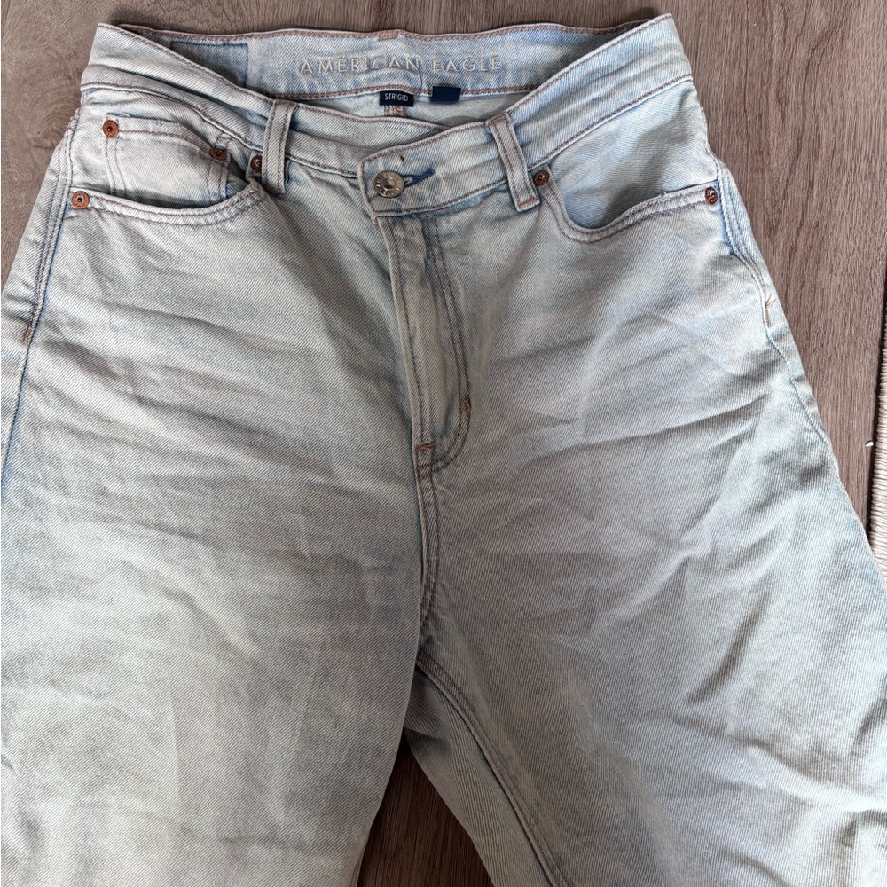 Crossover waist straight leg jeans